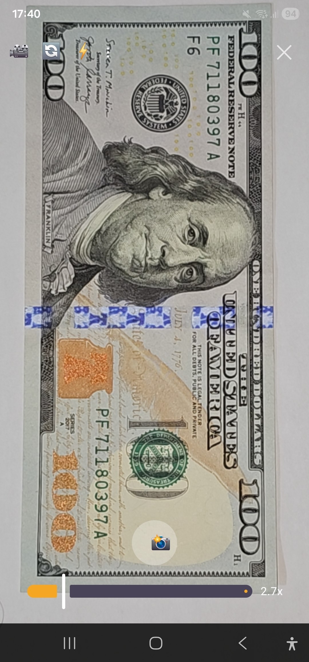 Billete de cien dólares visto con Ardi Lupa a 2.7x