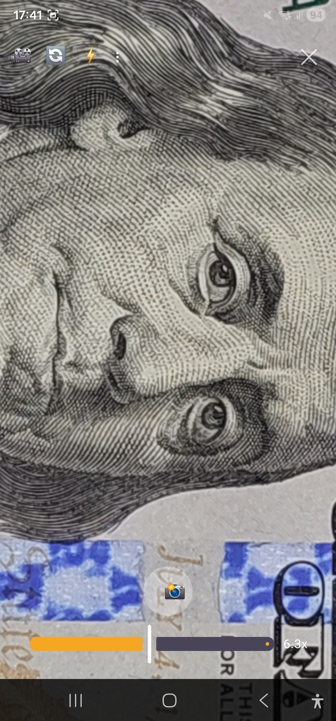 Detalle de un billete de cien dólares examinado a 6.3x con Ardi Lupa